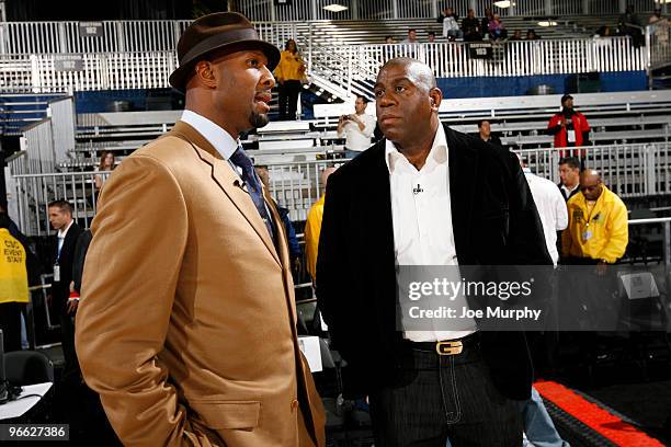 Legends and team coaches Alonzo Mourning and Earvin "Magic" Johnson talk prior to the 2010 NBA All-Star Celebrity Game presented by FINAL FANTASY...