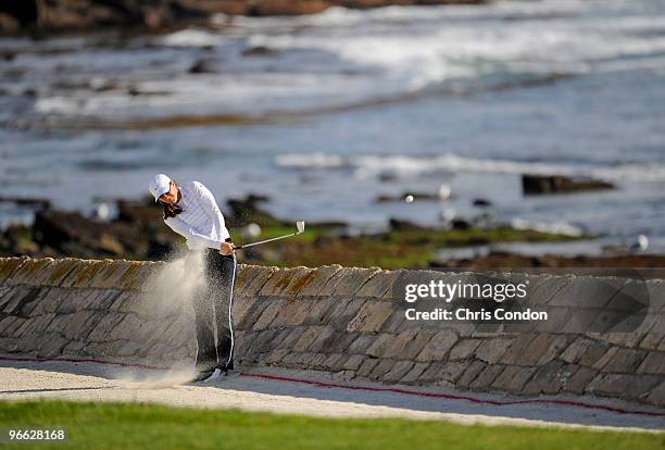 Brandi Chastain hits from a fairway bunker on during the second round of the AT&T Pebble Beach National Pro-Am at Pebble Beach Golf Links on February...