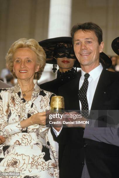 Bernadette Chirac and fashion designer Erik Mortensen , winner of the De Dor award on July 30, 1987 in Paris, France.