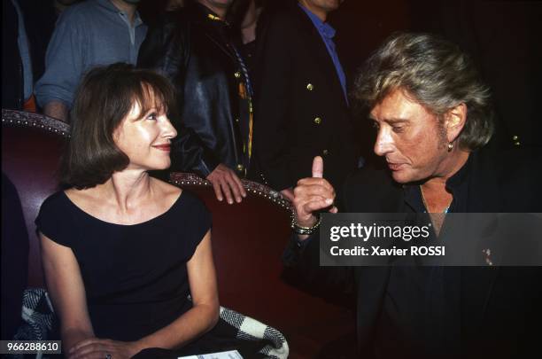 Actress Nathalie Baye And Johnny Hallyday At Party For Singer Dalida At Queen Disco In Paris, March 13, 1995.