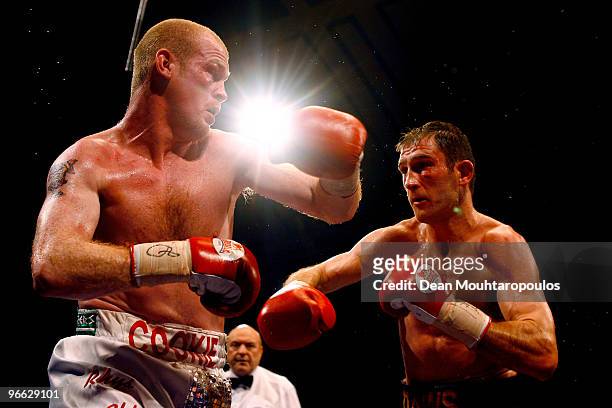Lenny Daws and Jason Cook exchange blows in the Light-Welterweight Title bout at York Hall on February 12, 2010 in London, England.