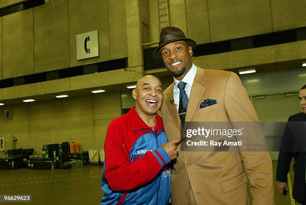 Harlem Globetrotters Legend Curly Neal poses with NBA Legend Alonzo Mourning prior to the 2010 NBA All-Star Celebrity Game presented by FINAL FANTASY...