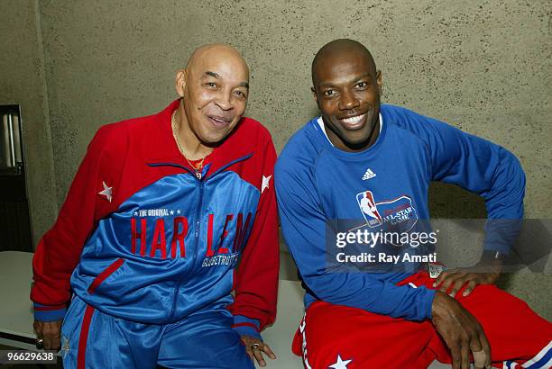Harlem Globetrotters legend Curly Neal poses with NFL player Terrell Owens prior to the 2010 NBA All-Star Celebrity Game presented by FINAL FANTASY...