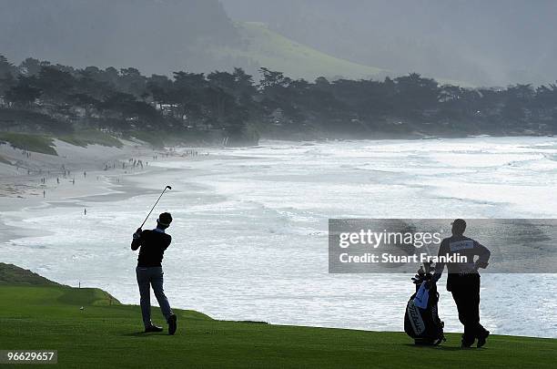 Ryuji Imada of Japan plays a shot on the nineth hole during round two of the AT&T Pebble Beach National Pro-Am at Pebble Beach Golf Links on February...