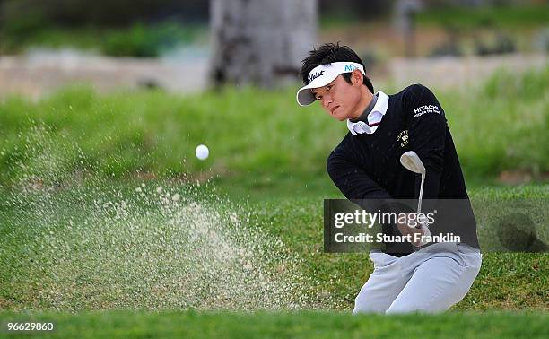 Ryuji Imada of Japan plays a bunker shot on the second hole during round two of the AT&T Pebble Beach National Pro-Am at Pebble Beach Golf Links on...