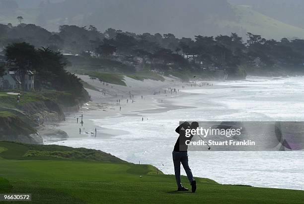 Ryuji Imada of Japan plays a shot on the nineth hole during round two of the AT&T Pebble Beach National Pro-Am at Pebble Beach Golf Links on February...