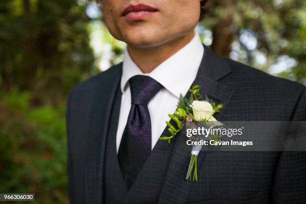 midsection of bridegroom in full suit - full suit ストックフォトと画像