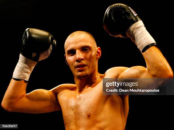 Chris Evangelou of Wood Green celbrates his victory over Johnny Greaves of East Ham during their Light-Welterweight bout at York Hall on February 12,...