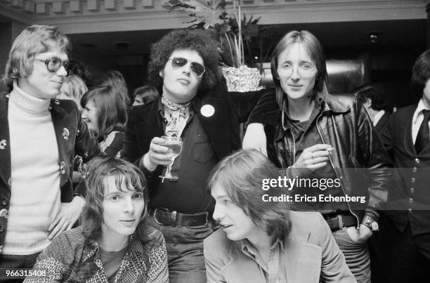 Group of music journlists and industry figures at an after show party at Burke's Restaurant in Mayfair , London , 1974. L-R back are Chris...