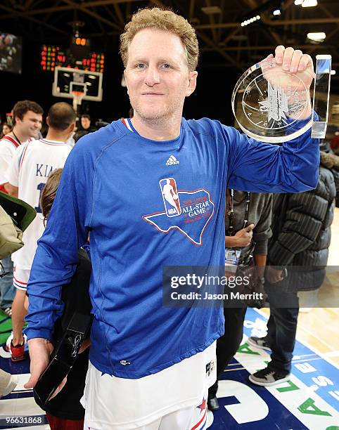 Actor Michael Rapaport poses with the winner's trophy during the NBA All-Star celebrity game presented by Final Fantasy XIII held at the Dallas...