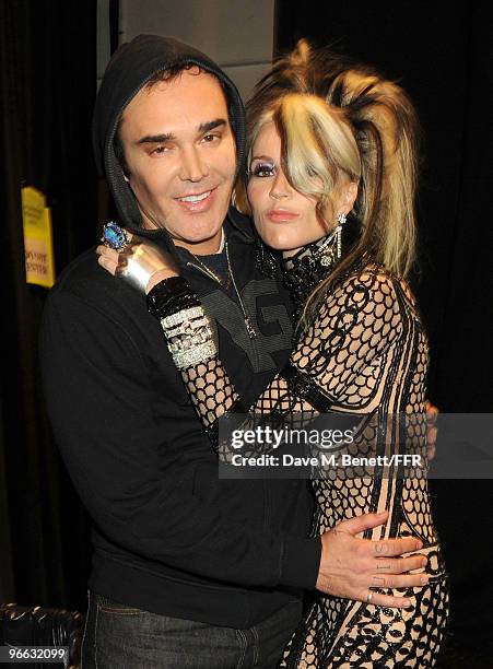 David LaChapelle and Daphne Guinness pose backstage at Naomi Campbell's Fashion For Relief Haiti NYC 2010 Fashion Show during Mercedes-Benz Fashion...