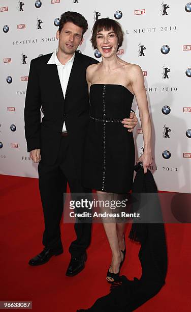 Actress Christiane Paul and guest arrive to the Festival Night 2010 at the Palais Am Festungsgraben on February 12, 2010 in Berlin, Germany.
