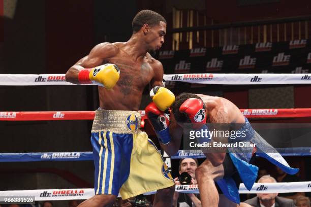 Wesley Ferrer lands a left hand against Angel Figueroa at the Fox Theater at Foxwoods Resort and Casino in Mashantucket, CT on September 01, 2016....