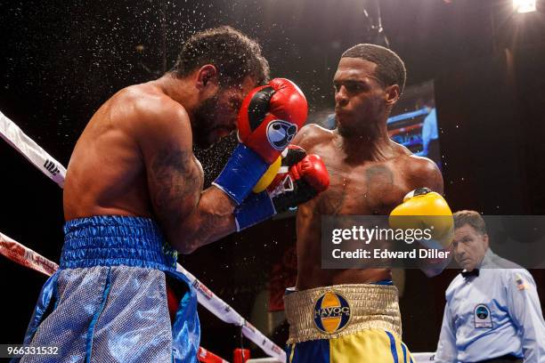 Wesley Ferrer lands a right hand against Angel Figueroa at the Fox Theater at Foxwoods Resort and Casino in Mashantucket, CT on September 01, 2016....