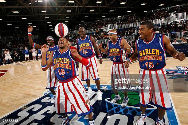 Flight Time Lang, Big Easy Lofton, Scooter Christensen and Special K Daley of the Harlem Globe Trotters perform during the 2010 NBA All-Star...