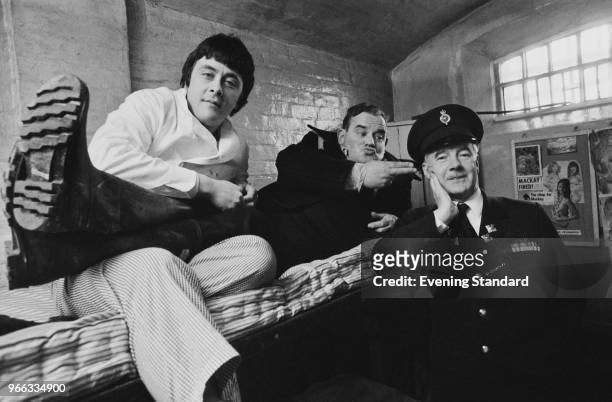 British actors Ronnie Barker , Richard Beckinsale and Fulton MacKay as they appeared in the popular BBC television series 'Porridge', and in the...