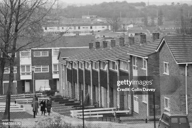 People walking near an housing estate in Basildon, UK, 28th February 1979.