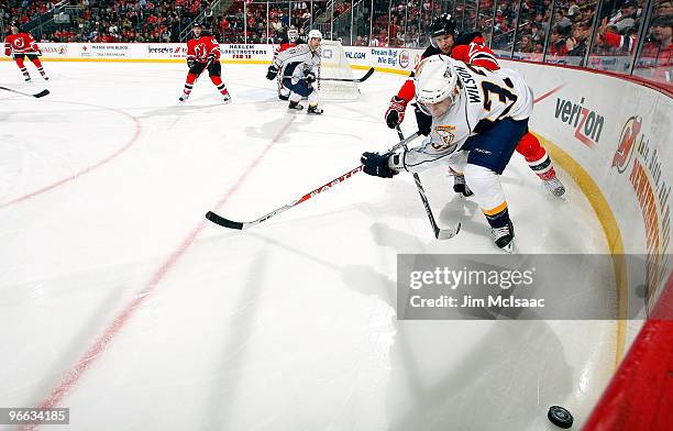 Colin Wilson of the Nashville Predators skates against the New Jersey Devils at the Prudential Center on February 12, 2010 in Newark, New Jersey. The...