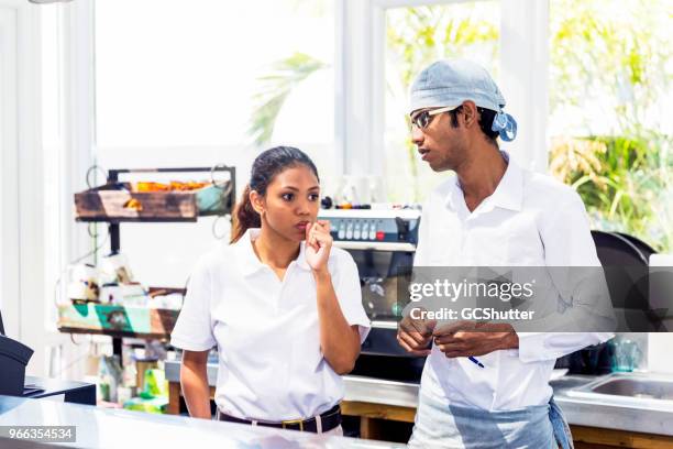 anxious baristas at a cafe - overworked waitress stock pictures, royalty-free photos & images