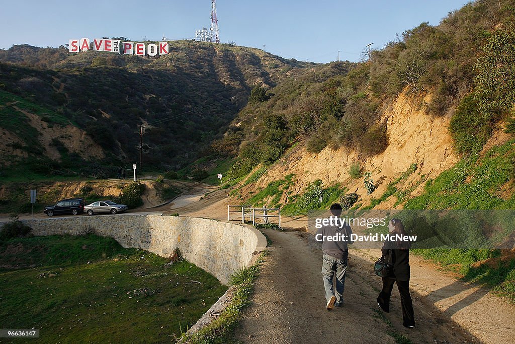 Famed Hollywood Sign Covered In Protest Of Possible Peak Development