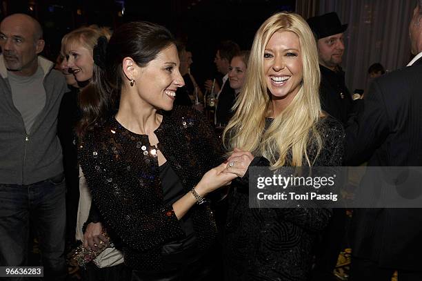 Actress Tara Reid and friend showing the ring attend the Movie Meets Media at Ritz Carlton Curtain Club on February 12, 2010 in Berlin, Germany.