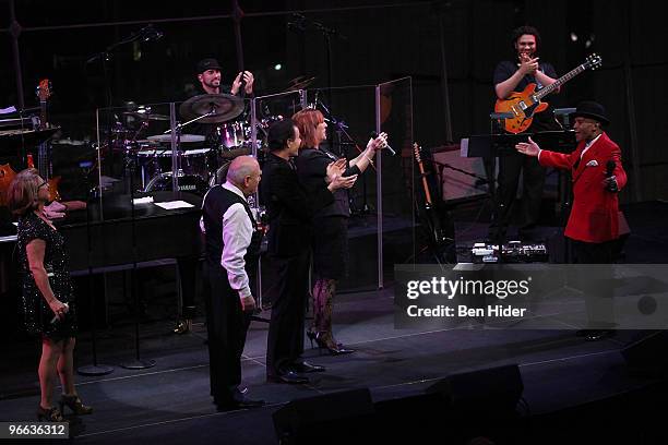 Singers Janis Siegel, Tim Hauser, Alan Paul and Cheryl Bentyne of The Manhattan Project welcome Jon Hendricks to the stage in the Allen Room at...