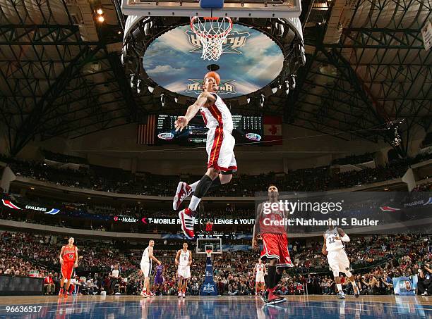 Michael Beasley of the Sophomore Team goes up for a dunk against the Rookie Team during the T-Mobile Rookie Challenge and Youth Jam as part of NBA...