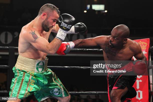 Stephen Ormond trades punches with Michael Clark at the Lowell Memorial Auditorium in Lowell, MA on October 10, 2015. Ormond would win by knockout in...