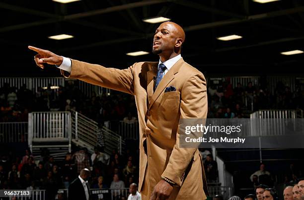 Alonzo Mourning NBA Legend reacts to a play during the 2010 NBA All-Star Celebrity Game presented by FINAL FANTASY XIII on center court during NBA...