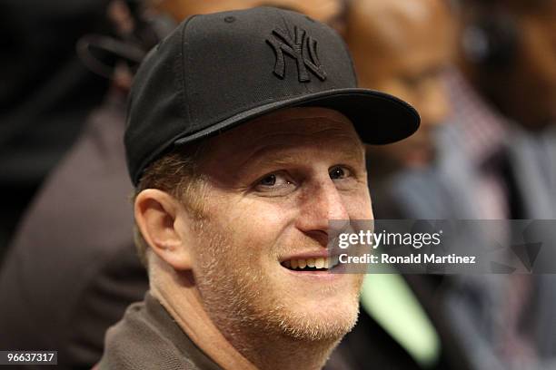 Actor Michael Rapaport smiles while watching the game between the Sophomore team and the Rookie team during the T-Mobile Rookie Challenge & Youth Jam...