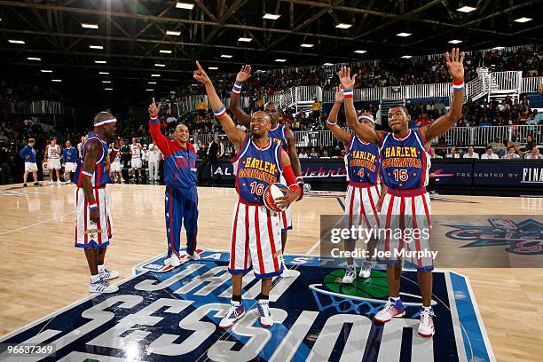 Flight Time Lang, Big Easy Lofton, Scooter Christensen and Special K Daley of the Harlem Globe Trotters perform during the 2010 NBA All-Star...