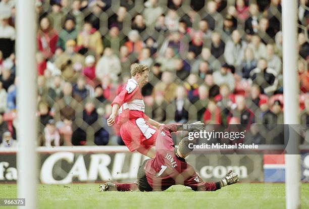 Alen Boksic of Middlesbrough tries to go round Paul Jones of Southampton during the FA Carling Premiership match played at the Riverside Stadium, in...