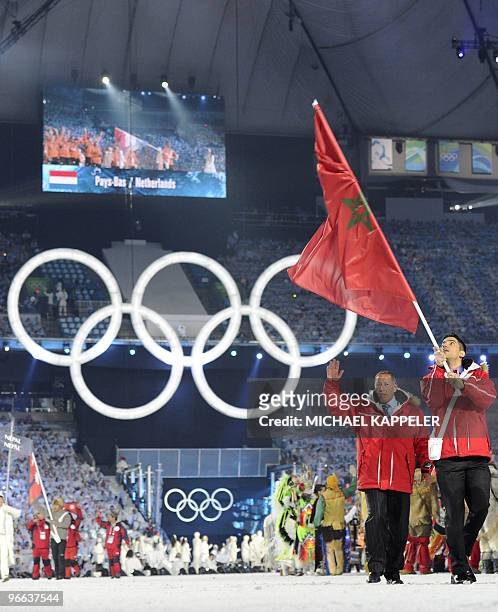 The Morroccan delegation tours the stadium, with Morrocco's alpine skiier Samir Azzimani as the flag bearer, at BC Place during the opening ceremony...
