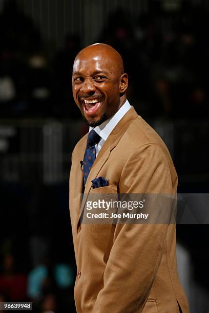 Alonzo Mourning NBA Legend reacts to a play during the 2010 NBA All-Star Celebrity Game presented by FINAL FANTASY XIII on center court during NBA...