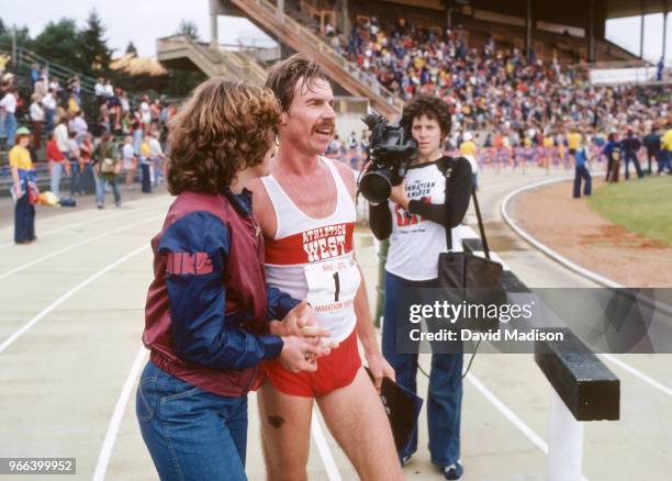 Dick Quax of New Zealand walks on the track moments after winning the Nike OTC Marathon on September 7, 1980 at Hayward Field in Eugene, Oregon. Quax...