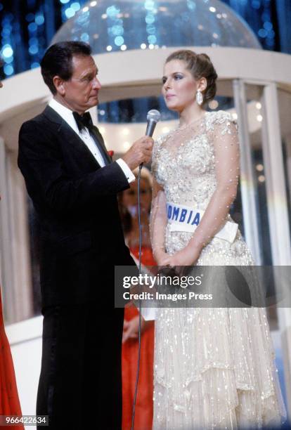 Bob Barker interviews contestants during Miss Universe on July 9, 1984 in Miami.