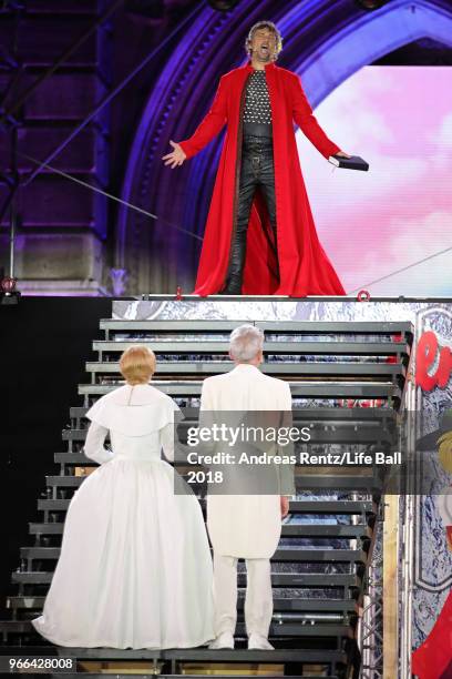 Jonas Kaufmann performs for Conchita Wurst and Herbert Foettinger on stage during the Life Ball 2018 show at City Hall on June 2, 2018 in Vienna,...