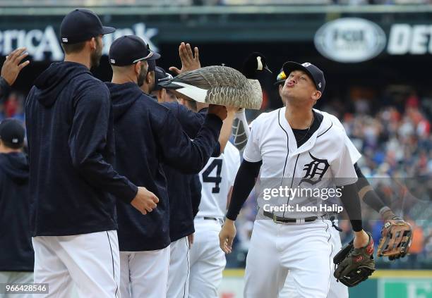 JaCoby Jones of the Detroit Tigers celebrates a win over the Toronto Blue Jays with a kiss to the 'rally goose' at Comerica Park on June 2, 2018 in...