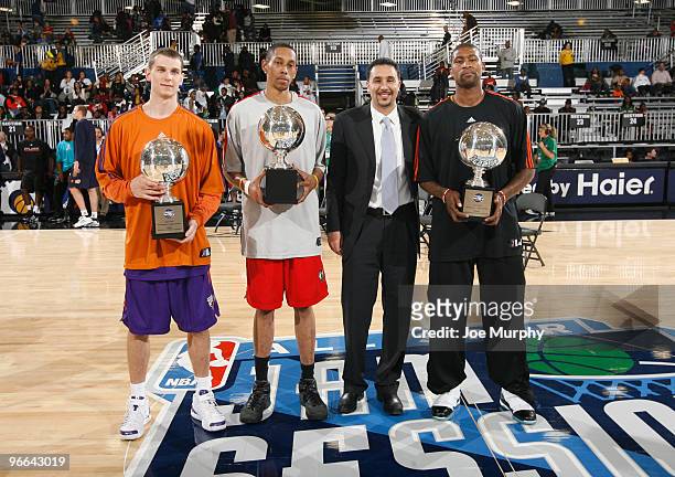 Dan Reed President of the NBA D-League stands with Trey Gilder of the Maine Red Claws, Pat Carroll of the Iowa Energy and Carlos Powell of the...