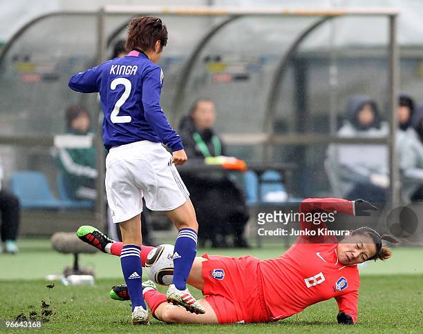 Yukari Kinga of Japan and Kye Lim Lee of South Korea compete for the ball during the East Asian Football Federation Women's Championship 2010 match...