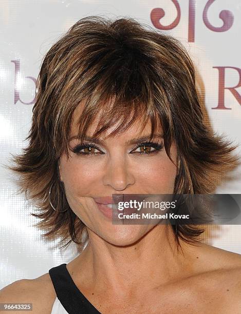 Actress Lisa Rinna arrives at the 7th anniversary celebration of her Belle Gray Boutique on February 12, 2010 in Los Angeles, California.