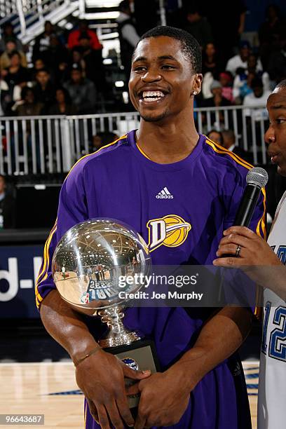 Dar Tucker of the Los Angeles D-Fenders celebrates winning the Slam Dunk Contest as part of the NBA D-League Dream Factory Friday Night presented by...