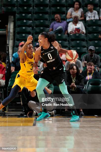 Marissa Coleman of the New York Liberty handles the ball against Tiffany Mitchell of the Indiana Fever on June 2, 2018 at Bankers Life Fieldhouse in...