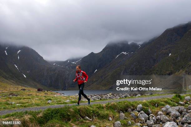 An athlete running at Eggum at The Arctic Triple - Lofoten Ultra-Trail on June 2, 2018 in Svolvar, Norway. Lofoten Ultra-Trail is one of three races...