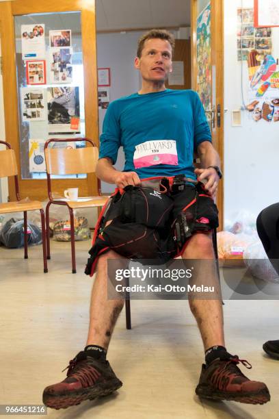 Hallvard Schjolberg takes a quick rest at one of the aidstations at The Arctic Triple - Lofoten Ultra-Trail on June 2, 2018 in Svolvar, Norway....