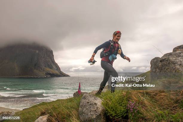 Karina Lie on the way up from Kvalvika beach at The Arctic Triple - Lofoten Ultra-Trail on June 2, 2018 in Svolvar, Norway. Lofoten Ultra-Trail is...