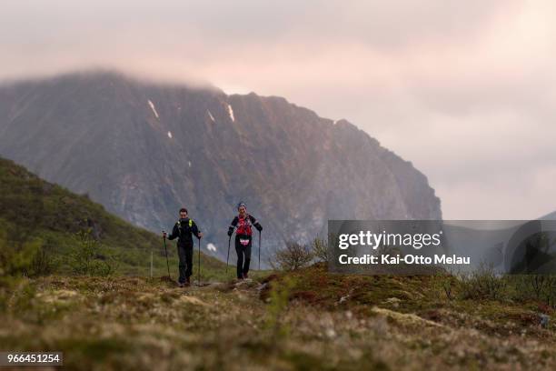 Athletes running past Offeroyskammen at The Arctic Triple - Lofoten Ultra-Trail on June 2, 2018 in Svolvar, Norway. Lofoten Ultra-Trail is one of...