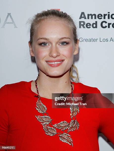 Leven Rambin arrives to the grand opening celebration of La Vida Restaurant to benefit the American Red Cross and Haiti relief held on February 12,...