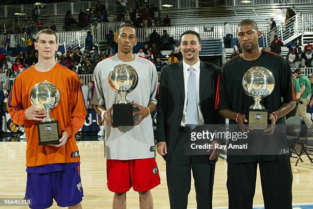 Matt Carroll of the Iowa Energy, Trey Gilder of the Maine Red Claws, NBA D-League President Dan Reed and Carlos Powell of the Albuquerque...