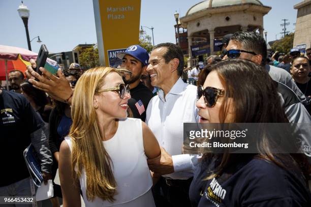 Antonio Villaraigosa, Democratic candidate for governor of California, center, and his wife Patricia Govea, front left, stand for photographs with...